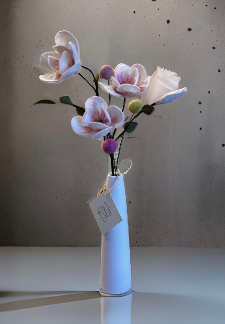 Bouquet of Magnolias in a White Vase