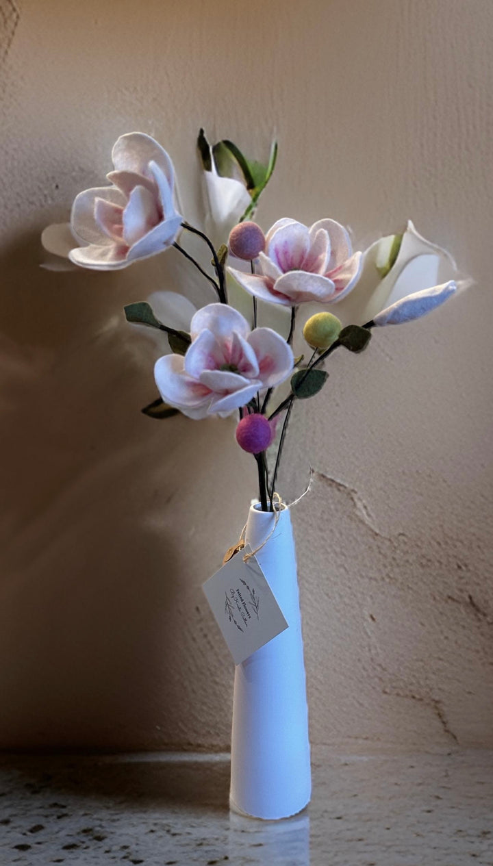 Bouquet of Magnolias in a White Vase