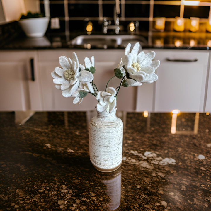 Bouquet of Daises in a table Vase