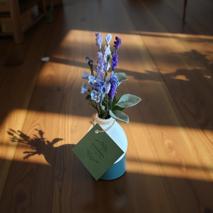 Lavender Blooms in a White Vase